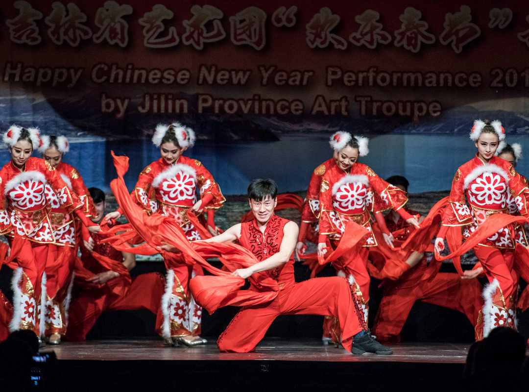 Dancers performing chinese dance routines. 