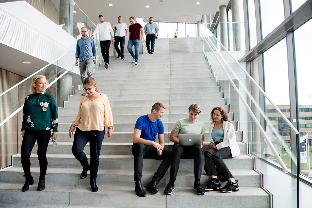 Students on the stairs of IBA. 